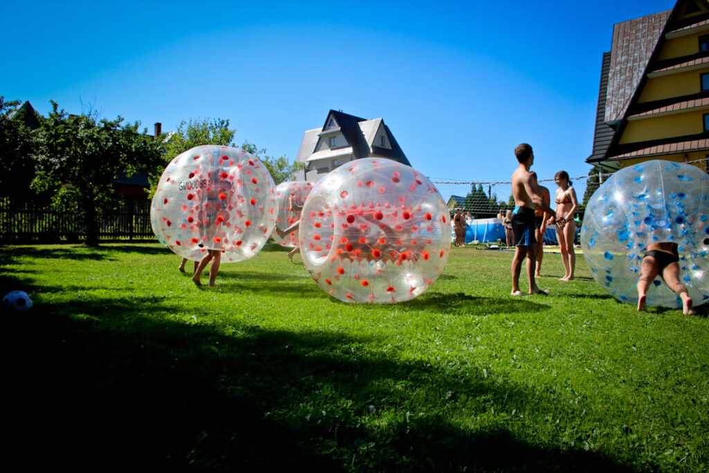 Bumper ball match on grass outdoors