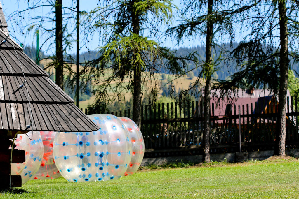 Bumper ball match on grass outdoors