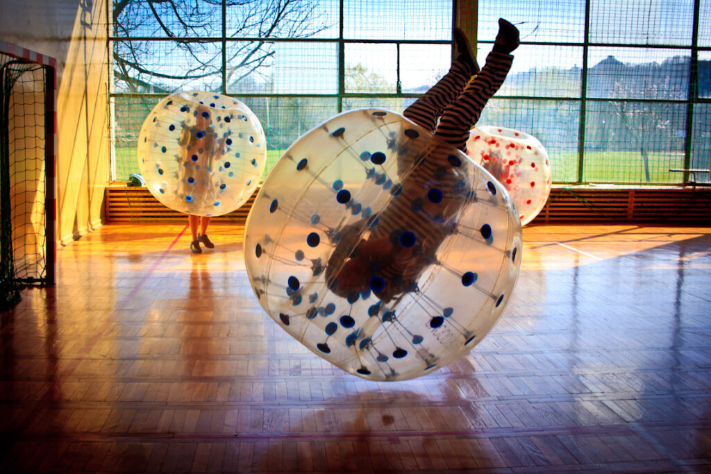 A somersault in a bumper ball during a match