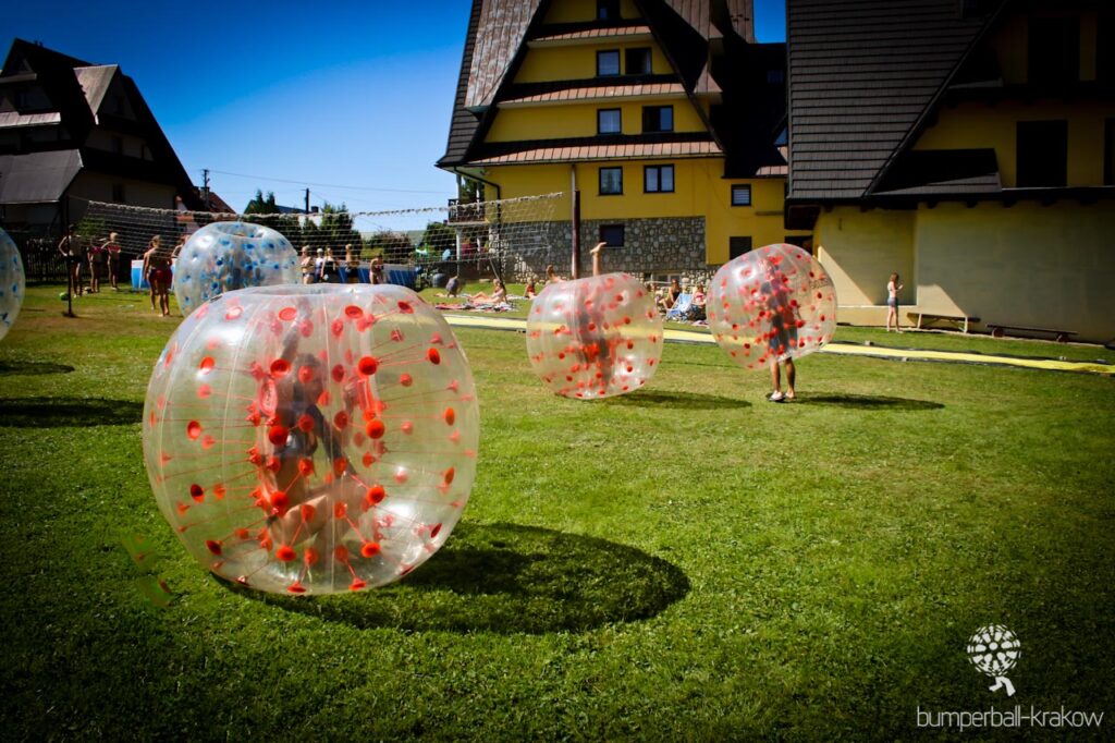 Bumper ball match on grass outdoors