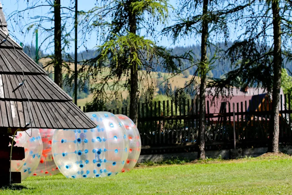 Bumper ball match on grass outdoors