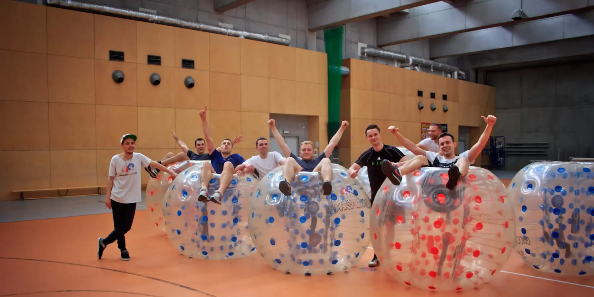A happy team after a bubble football match