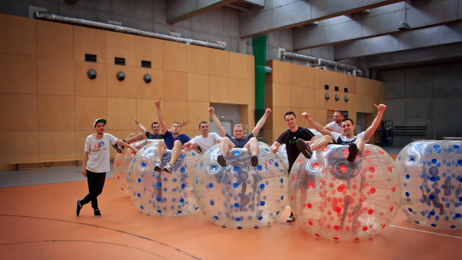 A happy team after a bubble football match
