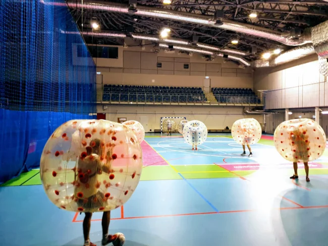 Bumper Ball game in inflatable balls at a sports hall in Kraków