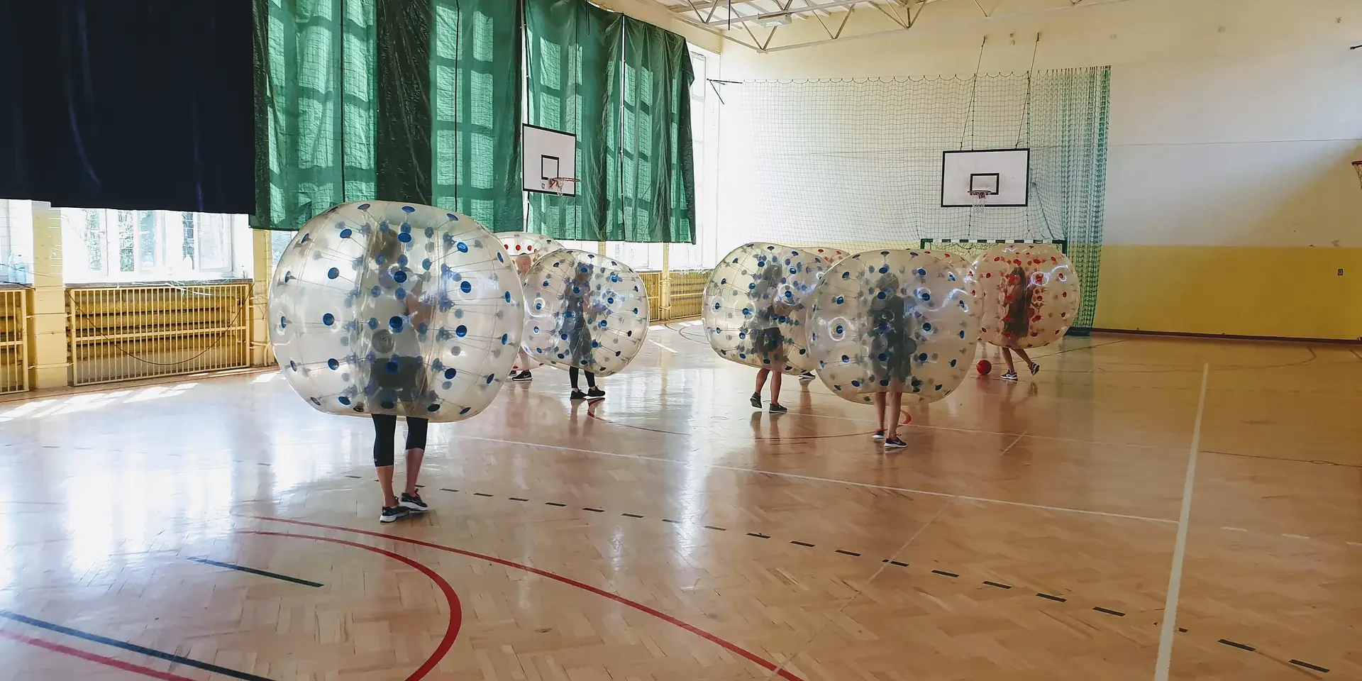 Bumper Ball game in inflatable balls at a sports hall in Kraków