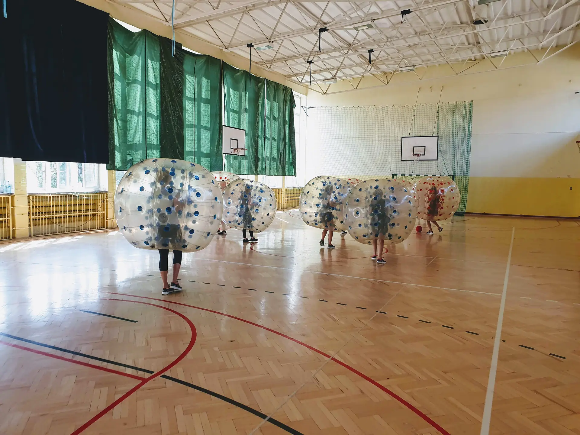Bumper Ball game in inflatable balls at a sports hall in Kraków