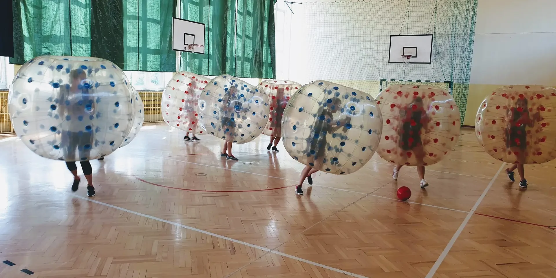Bumper Ball game in inflatable balls at a sports hall in Kraków