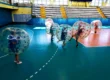 Bumper Ball game in inflatable balls at a sports hall in Kraków