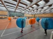Bumper Ball game in inflatable balls at a sports hall in Kraków