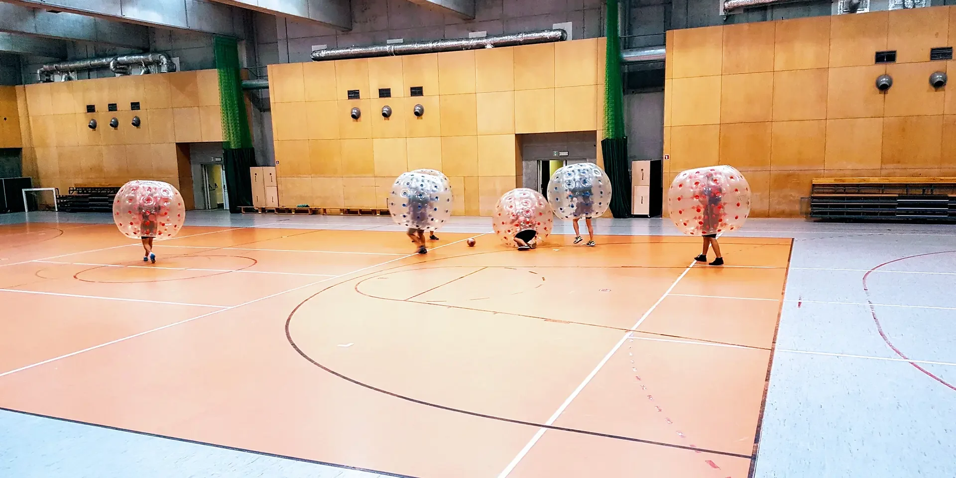 Bumper Ball game in inflatable balls at a sports hall in Kraków