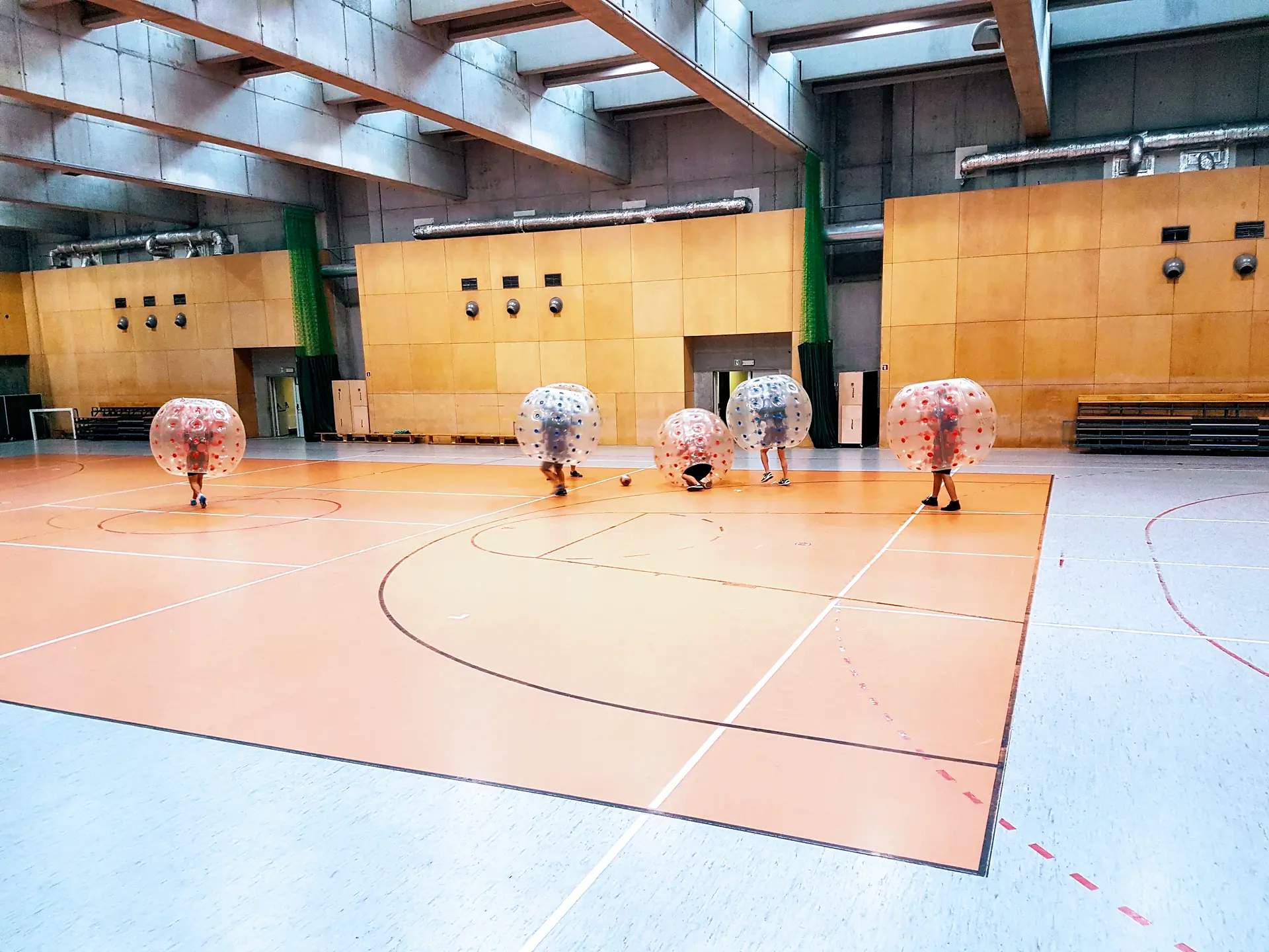 Bumper Ball game in inflatable balls at a sports hall in Kraków