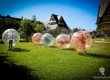 Bumper ball match on grass outdoors