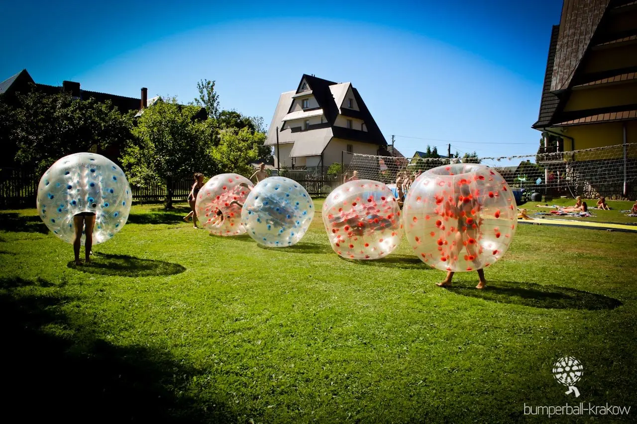 Bumper ball match on grass outdoors