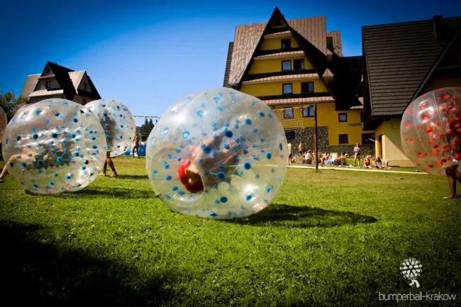 Bumper ball match on grass outdoors