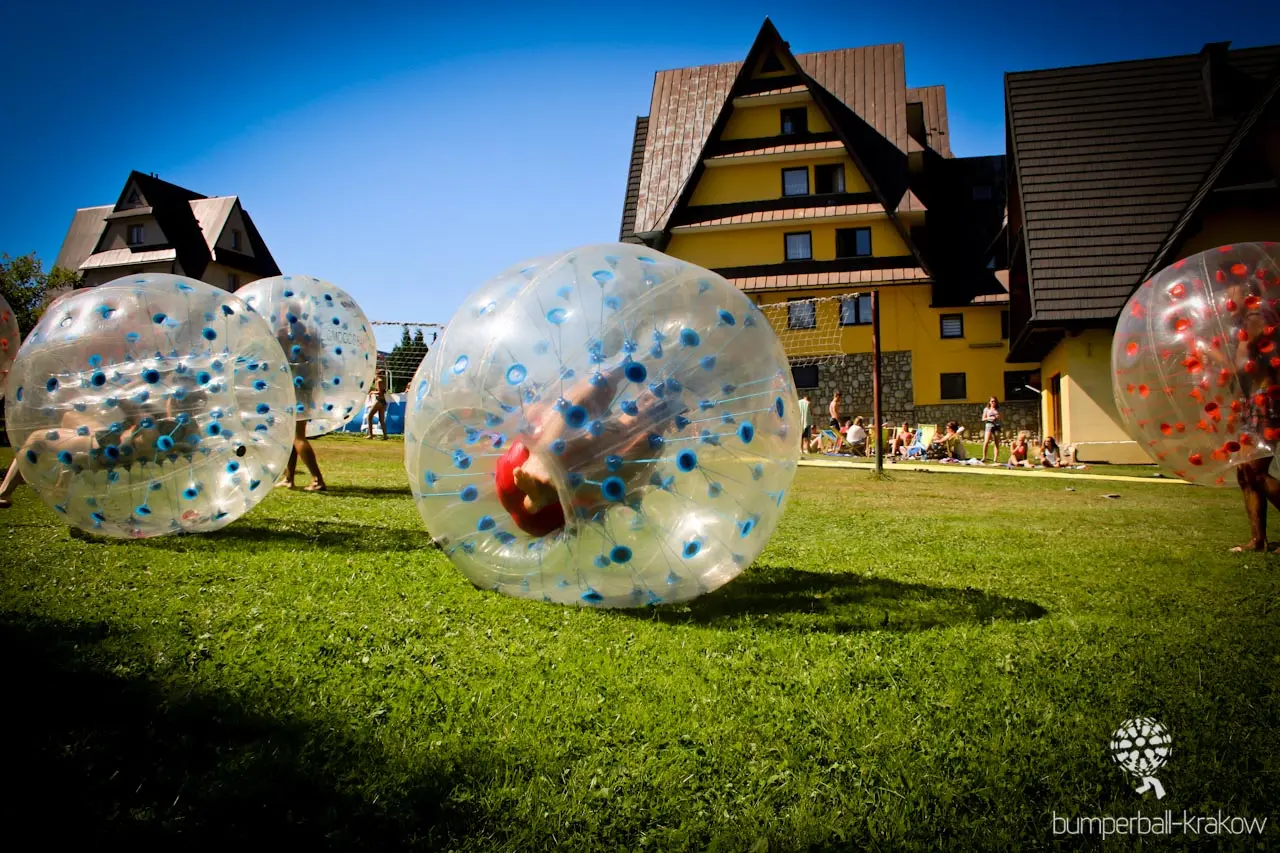 Bumper ball match on grass outdoors